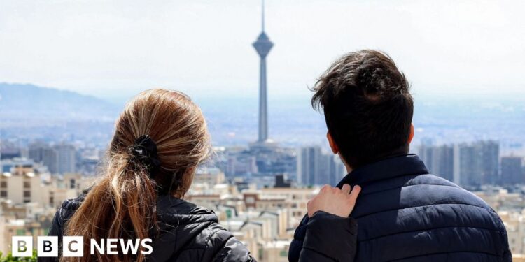 'You're no longer my sister' – rows erupt as war divides Iranian families