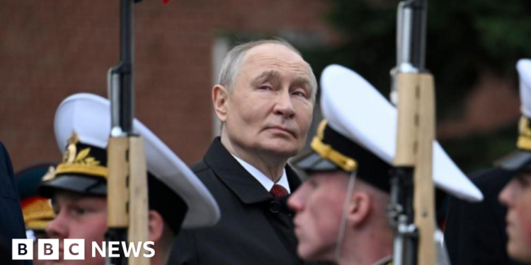 Putin denounces Nato at scaled back Victory Day parade