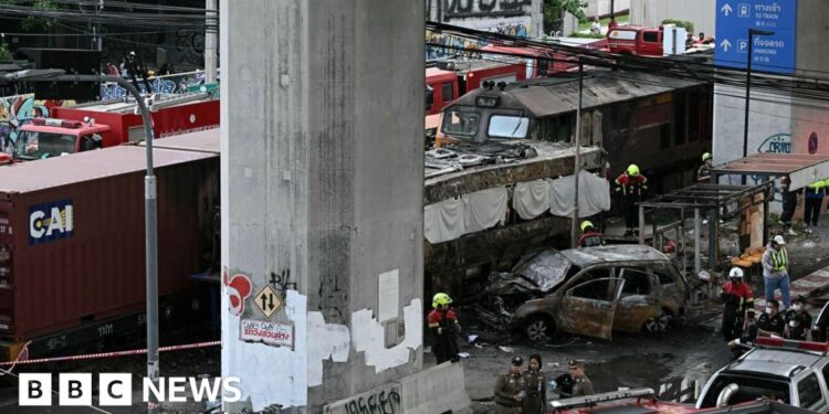 Freight train and bus crash kills at least eight in Bangkok