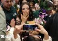 Eurovision winner Dara arrives to screaming fans in Bulgaria