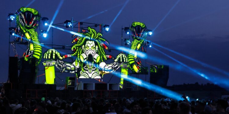 Illegal ‘free party’ at French military site draws up to 40,000 ravers | Music