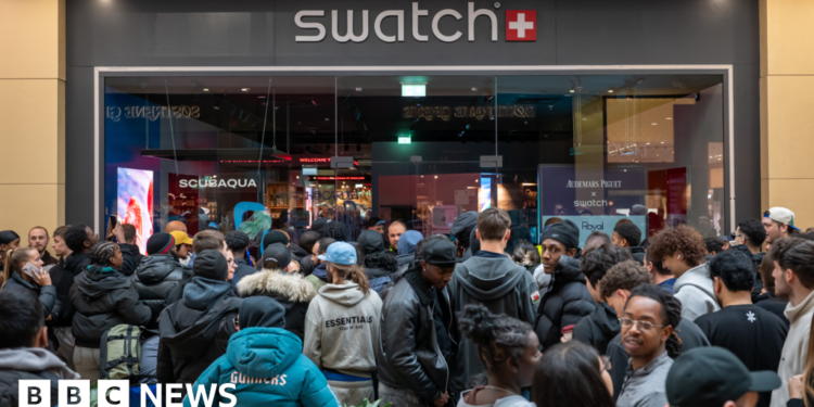 Swatch shuts stores after crowds queue for new watch