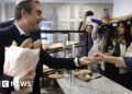 French PM fuels row with trip to buy baguettes