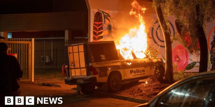 Violence in Australian town after arrest of man over girl's murder